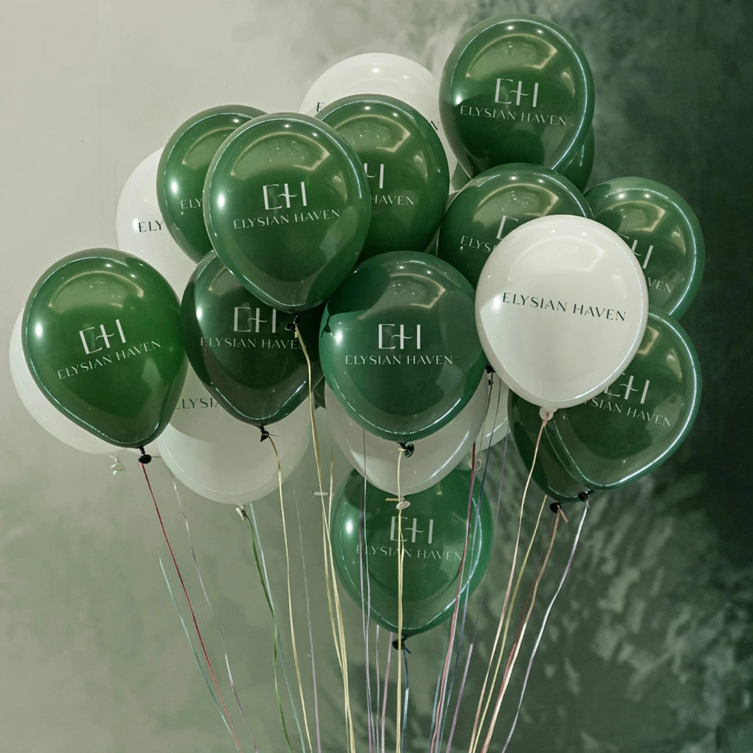 Green and ivory branded balloons