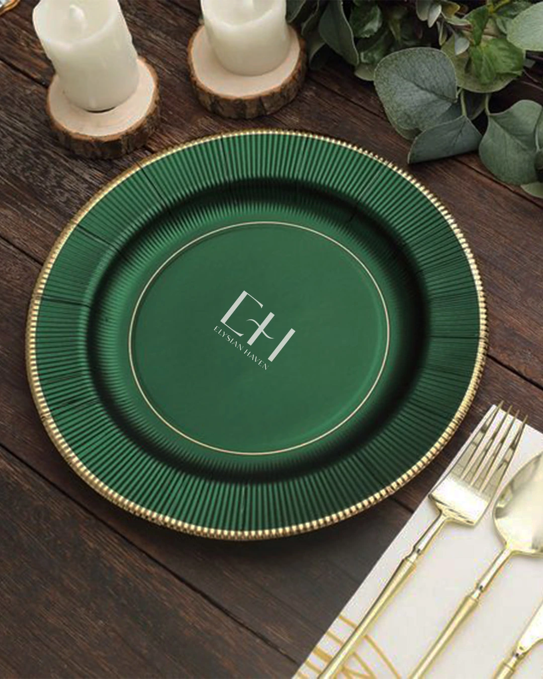 Deep green plate with gold rim and EH monogram