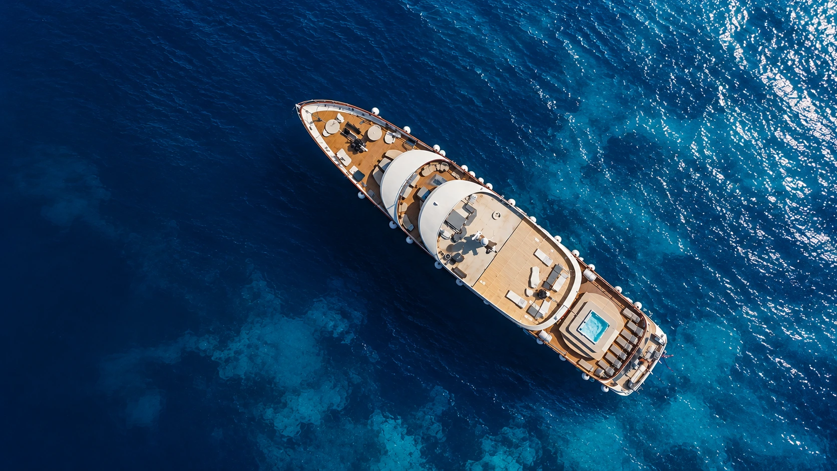 Aerial view of the Lastavica yacht on deep blue sea